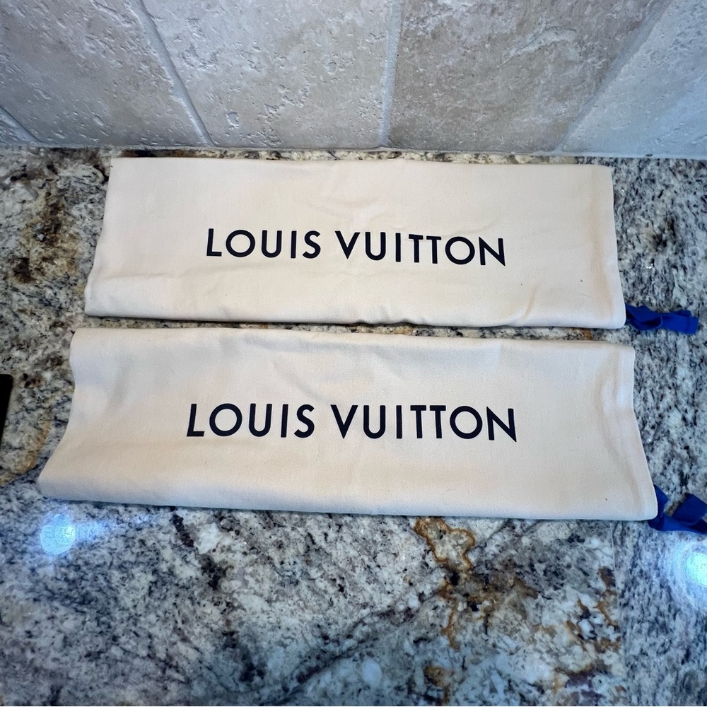 Authentic Louis Vuitton dust bags.